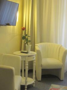 Un lugar para sentarse en Hotel-Pension Adler Untertürkheim