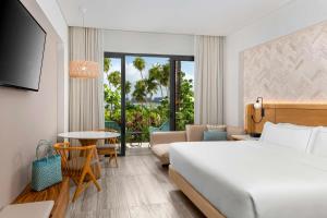 Postel nebo postele na pokoji v ubytování Hilton Tulum Riviera Maya All-Inclusive Resort