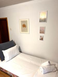 Ένα ή περισσότερα κρεβάτια σε δωμάτιο στο Heartbeat