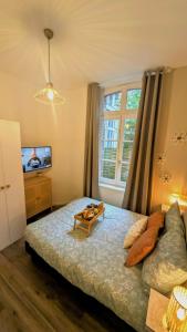 Postel nebo postele na pokoji v ubytování Le vintage RDC + 17 fotografií