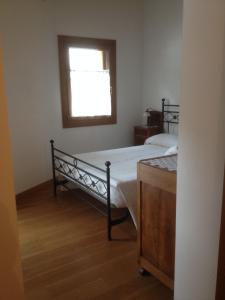 Łóżko lub łóżka w pokoju w obiekcie Il Capriolo Felice - Agriturismo