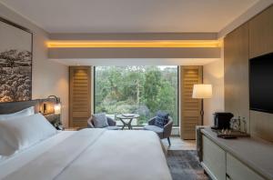 Kwetu Nairobi, Curio Collection By Hilton客房内的一张或多张床位