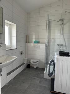 Koupelna v ubytování Monteur -sowie Ferienwohnungen in Grünberg, nahe Gießen
