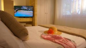 Voodi või voodid majutusasutuse Gattarella Family Resort Puglia - Standard Half-Board à buffet toas