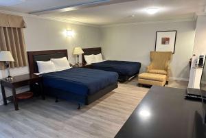 Postel nebo postele na pokoji v ubytování Travelodge by Wyndham Langley