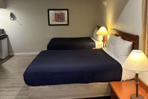 Postel nebo postele na pokoji v ubytování Travelodge by Wyndham Langley