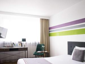 Postel nebo postele na pokoji v ubytování ibis Styles Bielsko Biala