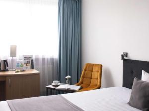 Postel nebo postele na pokoji v ubytování ibis Styles Bielsko Biala