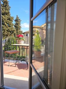 A balcony or terrace at Chiantirooms Guesthouse