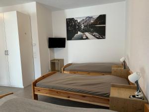 Postel nebo postele na pokoji v ubytování Monteur -sowie Ferienwohnungen in Grünberg, nahe Gießen