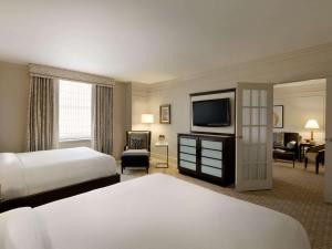 Postel nebo postele na pokoji v ubytování Fairmont Hotel Vancouver