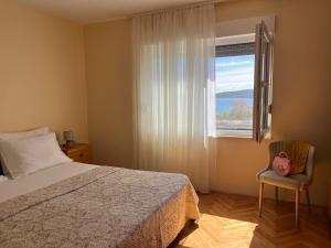 Postel nebo postele na pokoji v ubytování Apartments Zulim + 37 fotografií