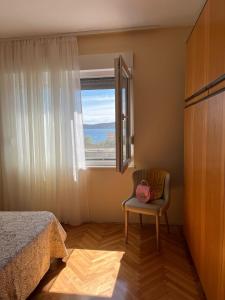 Postel nebo postele na pokoji v ubytování Apartments Zulim