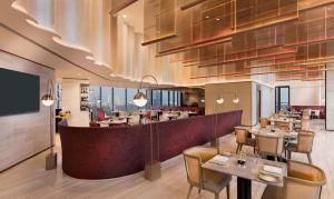 Veitingastaður eða matsölustaður á Hilton Kathmandu