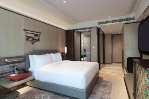 Rúm í herbergi á Hilton Kathmandu