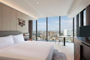 Rúm í herbergi á Hilton Kathmandu