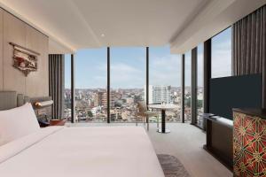 Rúm í herbergi á Hilton Kathmandu