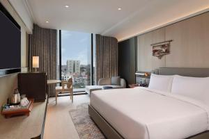 Rúm í herbergi á Hilton Kathmandu