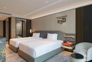 Rúm í herbergi á Hilton Kathmandu