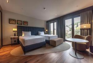 Keight Hotel Opatija, Curio Collection By Hilton客房内的一张或多张床位