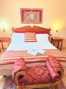 Postel nebo postele na pokoji v ubytování D'Angelo Palace Hotel