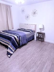 Ένα ή περισσότερα κρεβάτια σε δωμάτιο στο Vacation home