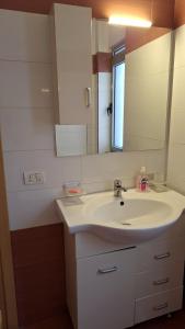 Koupelna v ubytování Balcony view + 16 fotografií