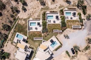 Bazén v ubytovaní Fari Stone Villas alebo v jeho blízkosti
