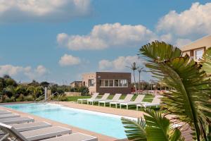Bazén v ubytování Terradamari Resort & Spa Marina di Modica,Tapestry by Hilton nebo v jeho okolí