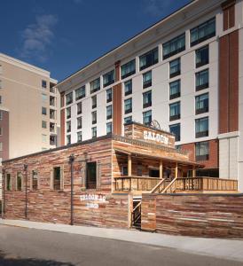 a hotel building in front of a building at Graduate by Hilton Knoxville in Knoxville