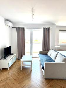 Μια τηλεόραση ή/και κέντρο ψυχαγωγίας στο Premium Central Apartment 8