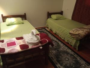 Postel nebo postele na pokoji v ubytování Al Sharif Hotel Apartments