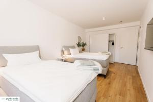 Postel nebo postele na pokoji v ubytování 124 QM - Exklusiv & Top angebunden - Werse Loft by youpartments