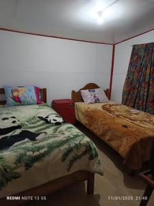 1 dormitorio con 2 camas en Casa en arriendo, en Quintero