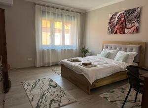 Postel nebo postele na pokoji v ubytování Kyuka House