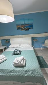 Postel nebo postele na pokoji v ubytování B&B Phistelia