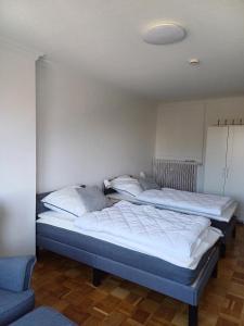 Postel nebo postele na pokoji v ubytování Gästezimmer Ilmenaudeich