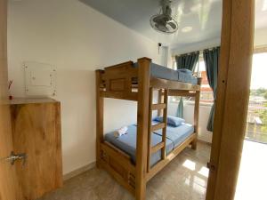 a bedroom with two bunk beds in a room at Hotel Panther Resort in Necoclí +16 photos