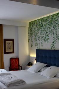 Postel nebo postele na pokoji v ubytování AH Art Hotel Palma