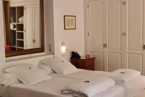 Postel nebo postele na pokoji v ubytování AH Art Hotel Palma