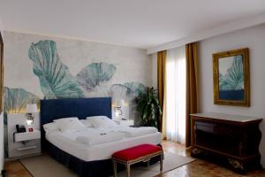 Postel nebo postele na pokoji v ubytování AH Art Hotel Palma