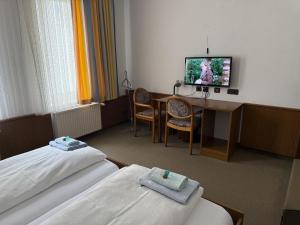 TV a/nebo společenská místnost v ubytování Lessinghof