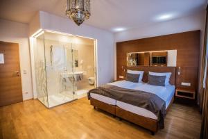 Postel nebo postele na pokoji v ubytování Hotel Stadt Wien