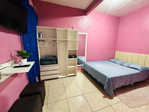 Postel nebo postele na pokoji v ubytování Vila Ws Fernandes