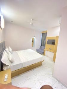 Postel nebo postele na pokoji v ubytování Hotel Elite