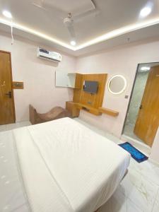 Postel nebo postele na pokoji v ubytování Hotel Elite