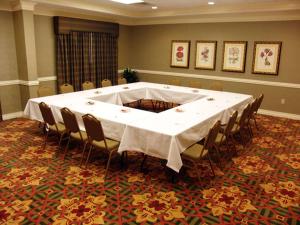 a large meeting room with a large table and chairs at Hampton Inn & Suites - Vicksburg in Vicksburg