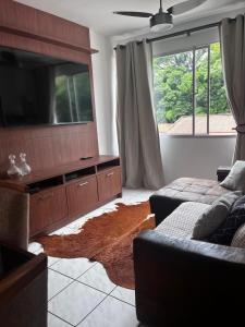 Χώρος καθιστικού στο Comfortable apartment in Florianópolis