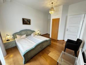 Postel nebo postele na pokoji v ubytování Hotel Zu den Linden