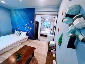 A bed or beds in a room at Fish's Home